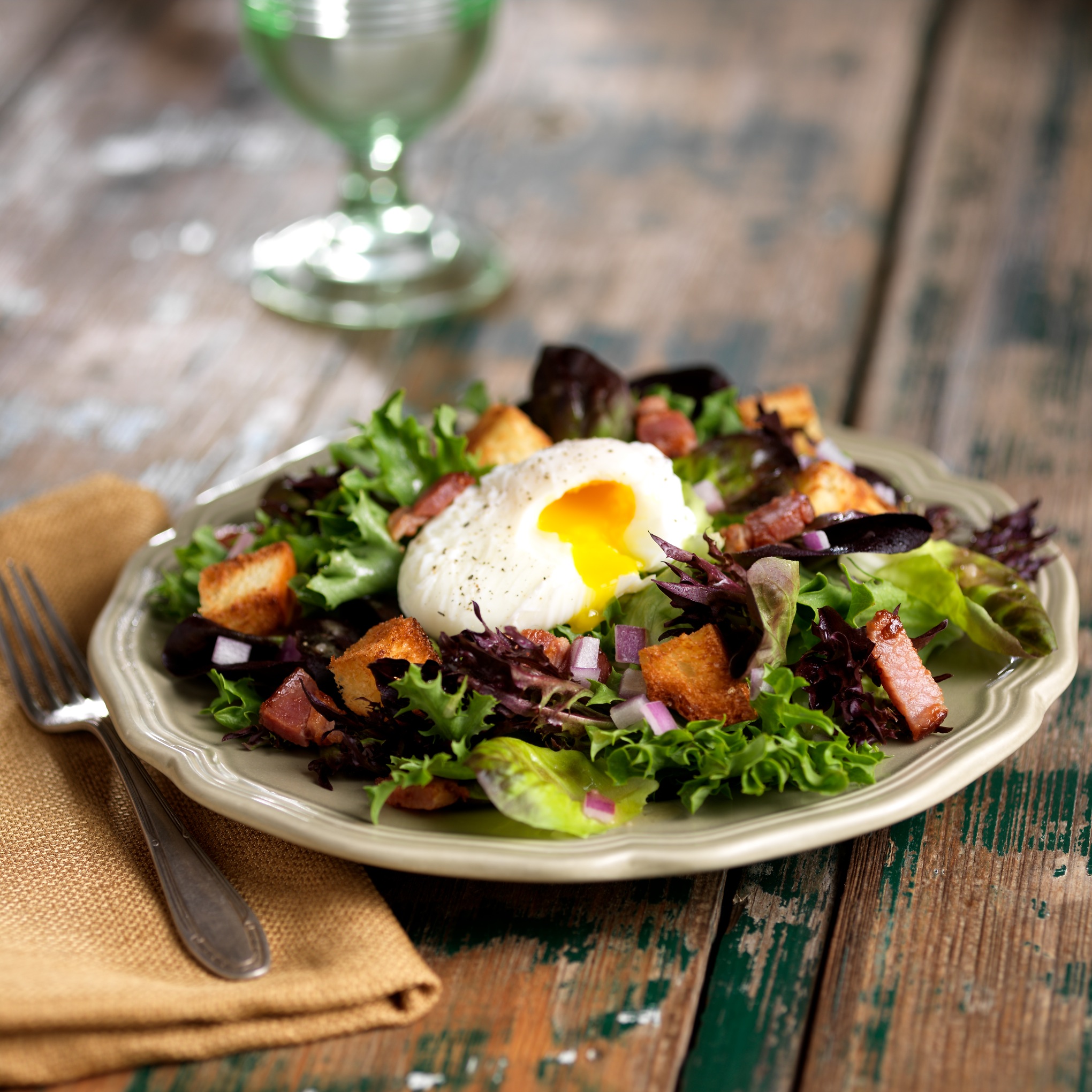 Arcadian Harvest Ruby® with Poached Egg, Lardons & Brioche Croutons Foodservice by Mann Packing