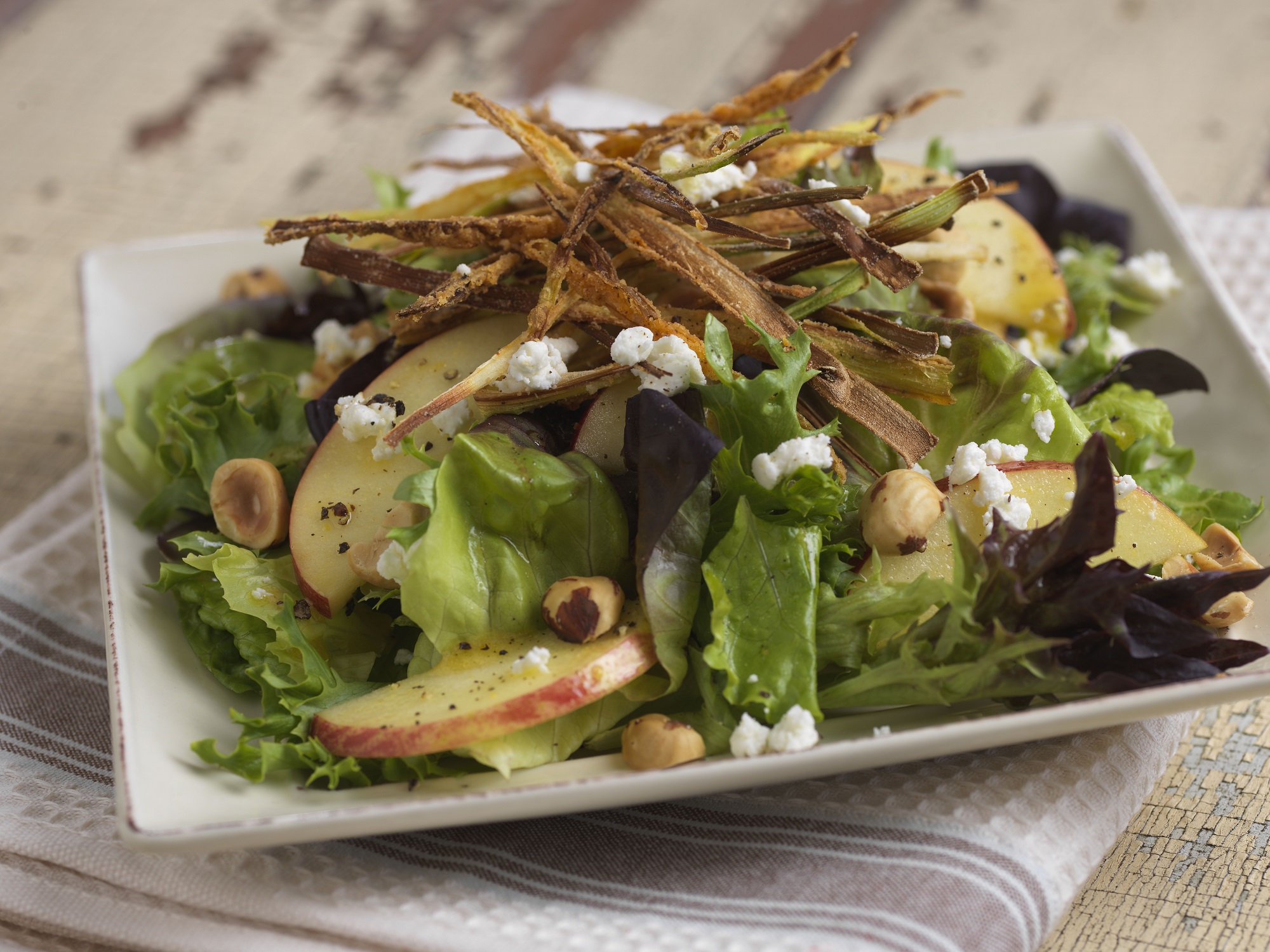 Red RomaBlend® Salad with Frizzled Leeks, Toasted Hazelnuts, Fuji Apples and Chevre - Foodservice by